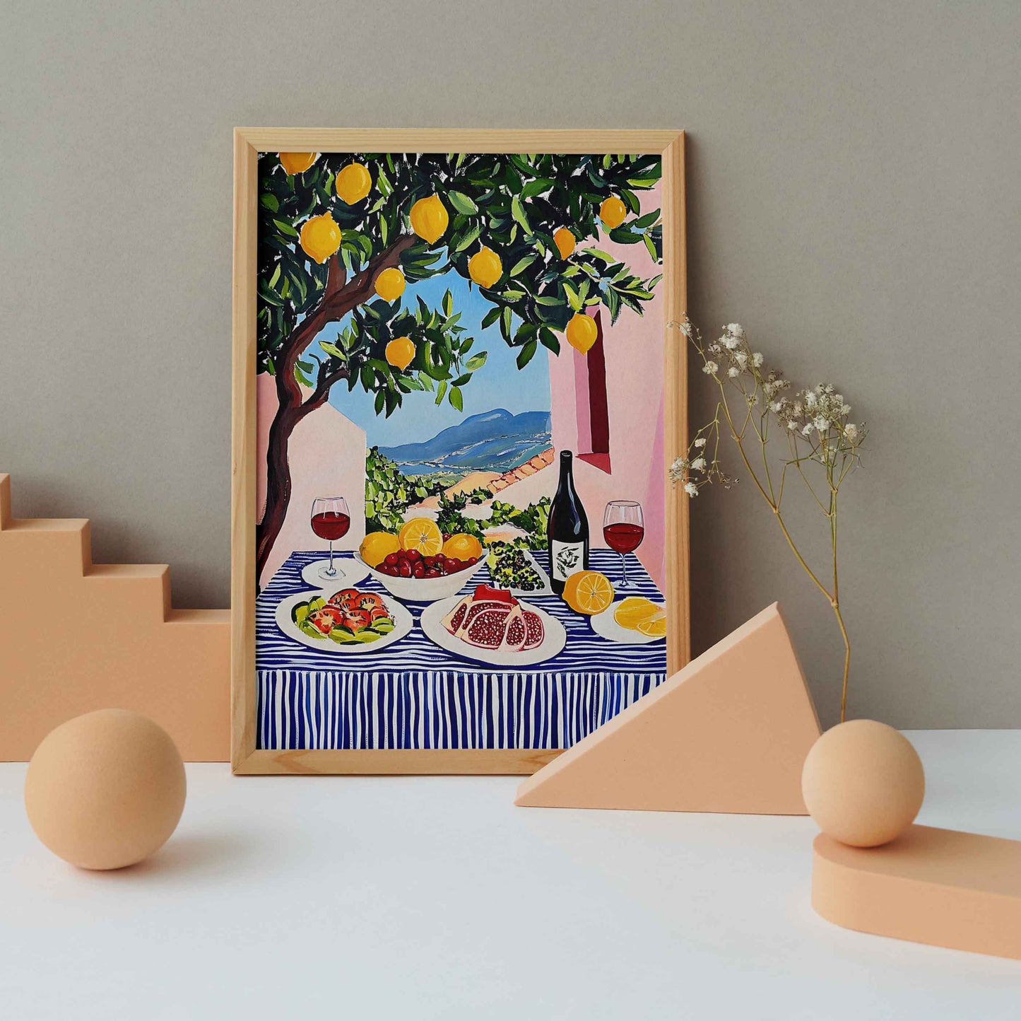 Affiche murale bohème scandinave représentant un citronnier et une table méditerranéenne colorée, style boho chic moderne.
