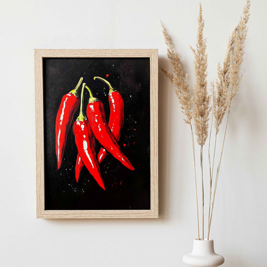 Affiche bohème scandinave représentant des piments rouges éclatants sur fond noir, décoration murale moderne et artistique.